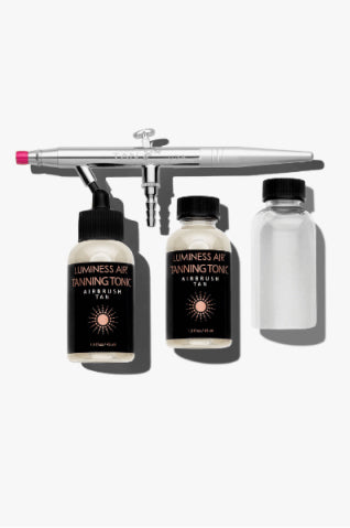 Tanning stylus with three bottles of tanning product