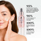 Close up photo of woman's face and hands. She is holding the Airbrush spray device in one hand and a bottle of foundation in the other.