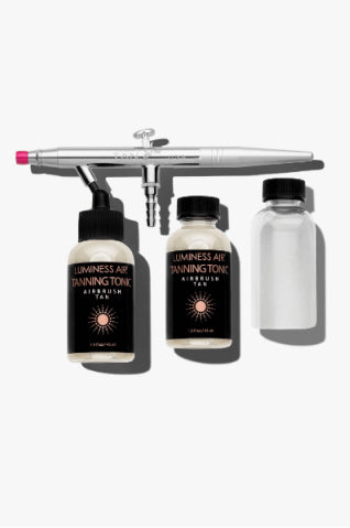 Tanning stylus with three bottles of tanning product