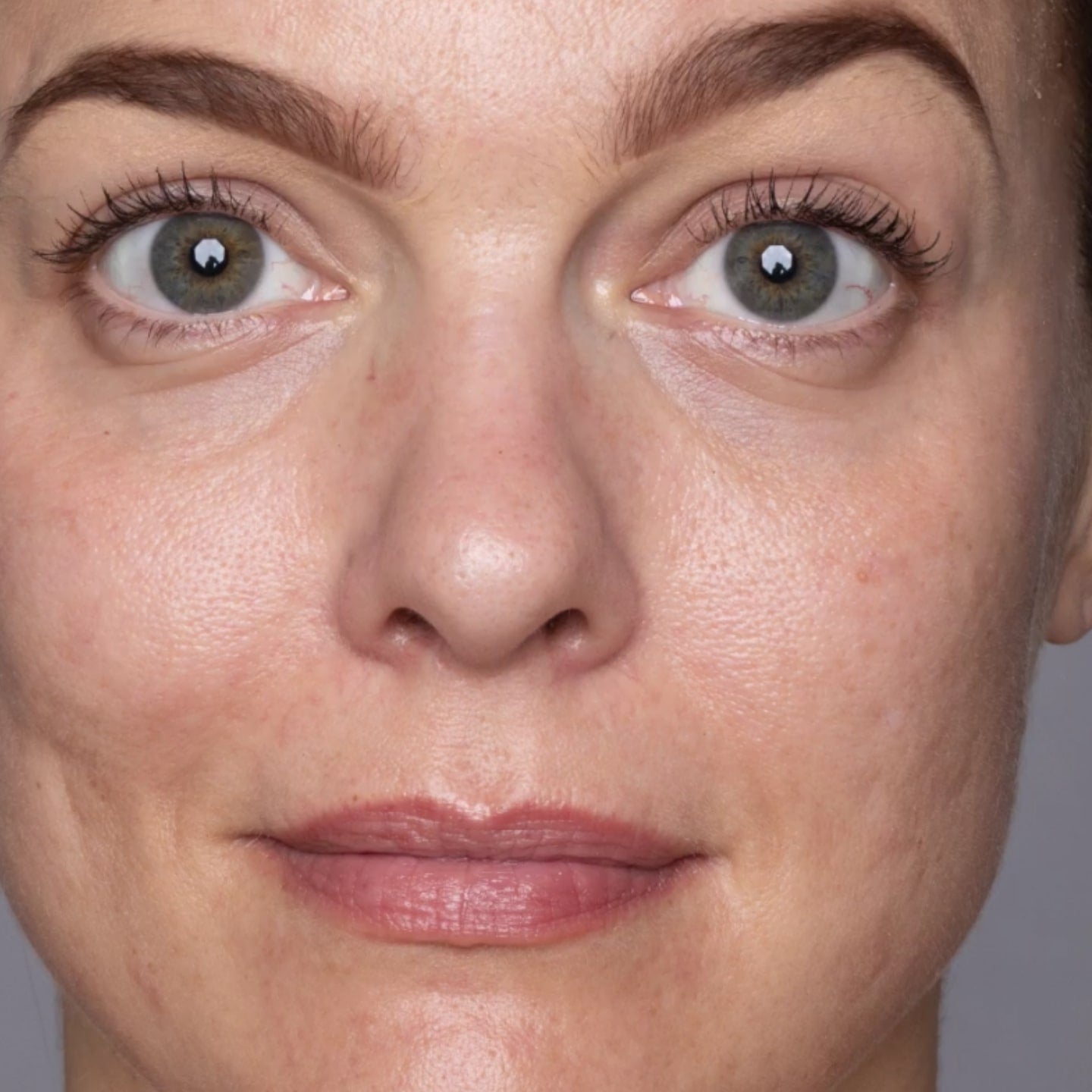 Close up of woman's face after using products